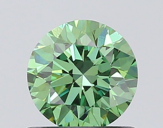 Loose Diamond - ROUND 0.71ct Fancy Vivid Green VVS2: Loose Diamond - ROUND 0.71ct Fancy Vivid Green VVS2 Source: This is a real non-mined Diamond that has been grown in a lab Shape: ROUND Carats: 0.71 Color: Fancy Vivid Green Certification: IGI Video: