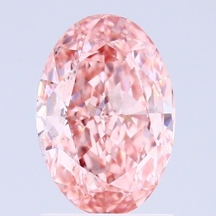 Loose Diamond - OVAL 1.48ct Fancy Vivid Pink VS2: Loose Diamond - OVAL 1.48ct Fancy Vivid Pink VS2 Source: This is a real non-mined Diamond that has been grown in a lab Shape: OVAL Carats: 1.48 Color: Fancy Vivid Pink Certification: IGI Video: