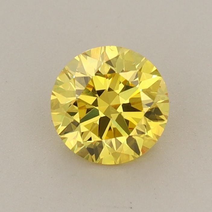 Loose Diamond - ROUND 0.62ct Fancy Vivid Yellow VS2: Loose Diamond - ROUND 0.62ct Fancy Vivid Yellow VS2 Source: This is a real non-mined Diamond that has been grown in a lab Shape: ROUND Carats: 0.62 Color: Fancy Vivid Yellow Certification: IGI Video: