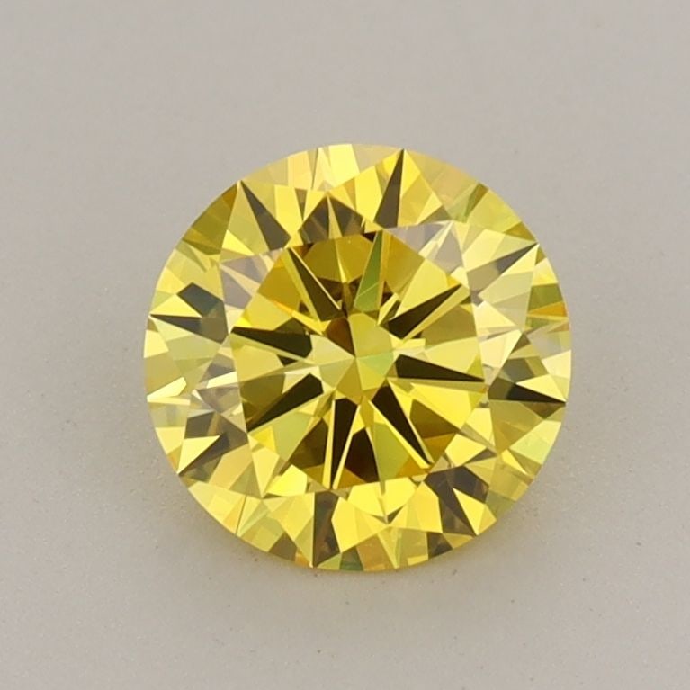 Loose Diamond - ROUND 1.0ct Fancy Vivid Yellow VVS2: Loose Diamond - ROUND 1.0ct Fancy Vivid Yellow VVS2 Source: This is a real non-mined Diamond that has been grown in a lab Shape: ROUND Carats: 1.0 Color: Fancy Vivid Yellow Certification: IGI Video: