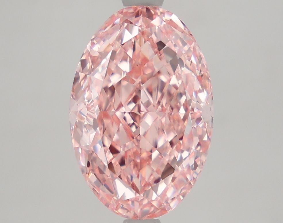Loose Diamond - OVAL 3.3ct Fancy Vivid Pink VS1: Loose Diamond - OVAL 3.3ct Fancy Vivid Pink VS1 Source: This is a real non-mined Diamond that has been grown in a lab Shape: OVAL Carats: 3.3 Color: Fancy Vivid Pink Certification: IGI Video: