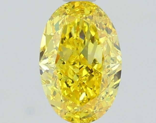Loose Diamond - OVAL 1.2ct Fancy Vivid Yellow VS1: Loose Diamond - OVAL 1.2ct Fancy Vivid Yellow VS1 Source: This is a real non-mined Diamond that has been grown in a lab Shape: OVAL Carats: 1.2 Color: Fancy Vivid Yellow Certification: IGI Video:
