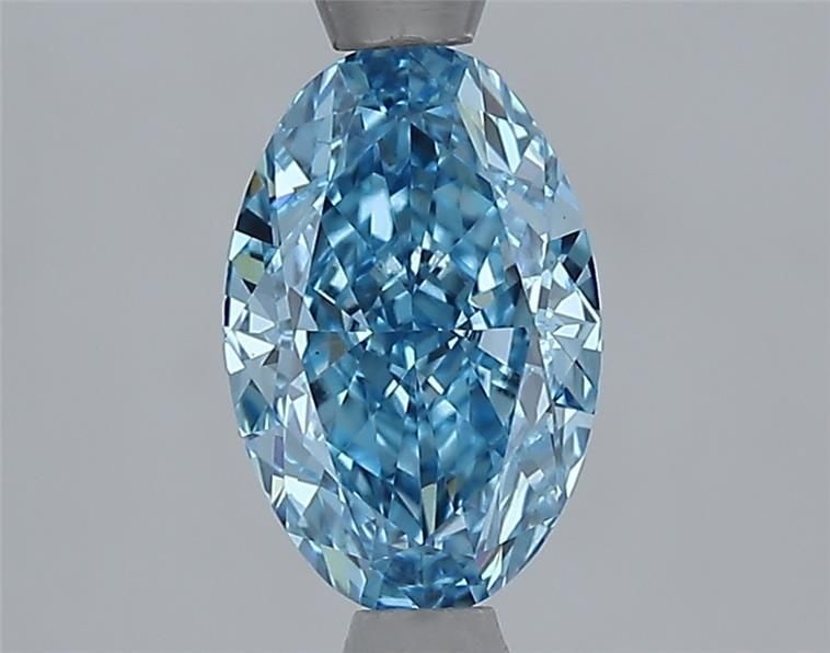 Loose Diamond - OVAL 1.56ct Fancy Vivid Blue VS1: Loose Diamond - OVAL 1.56ct Fancy Vivid Blue VS1 Source: This is a real non-mined Diamond that has been grown in a lab Shape: OVAL Carats: 1.56 Color: Fancy Vivid Blue Certification: IGI Video: