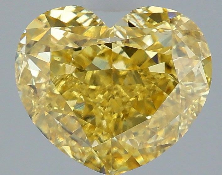 Loose Diamond - HEART 3.09ct Fancy Vivid Yellow VS1: Loose Diamond - HEART 3.09ct Fancy Vivid Yellow VS1 Source: This is a real non-mined Diamond that has been grown in a lab Shape: HEART Carats: 3.09 Color: Fancy Vivid Yellow Certification: IGI Video: