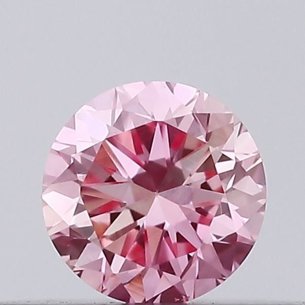 Loose Diamond - ROUND 0.14ct Fancy Vivid Pink VS1: Loose Diamond - ROUND 0.14ct Fancy Vivid Pink VS1 Source: This is a real non-mined Diamond that has been grown in a lab Shape: ROUND Carats: 0.14 Color: Fancy Vivid Pink Certification: IGI Video: