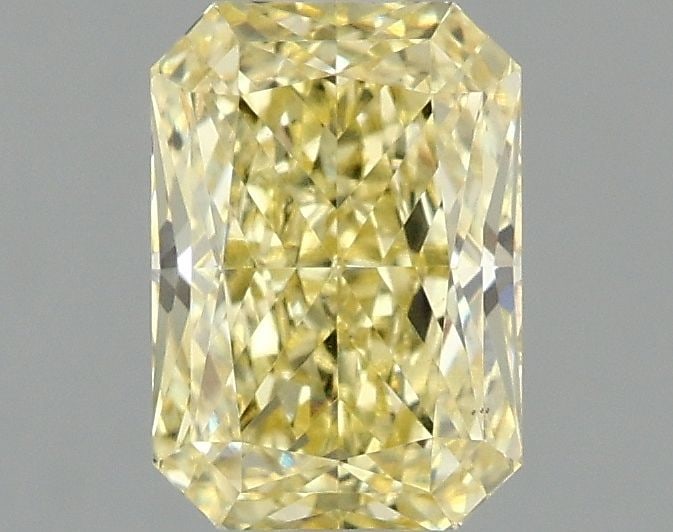 Loose Diamond - RADIANT 1.55ct Fancy Vivid Yellow VS1: Loose Diamond - RADIANT 1.55ct Fancy Vivid Yellow VS1 Source: This is a real non-mined Diamond that has been grown in a lab Shape: RADIANT Carats: 1.55 Color: Fancy Vivid Yellow Certification: IGI Vid