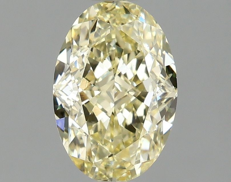 Loose Diamond - OVAL 1.56ct Fancy Yellow VS2: Loose Diamond - OVAL 1.56ct Fancy Yellow VS2 Source: This is a real non-mined Diamond that has been grown in a lab Shape: OVAL Carats: 1.56 Color: Fancy Yellow Certification: IGI Video: