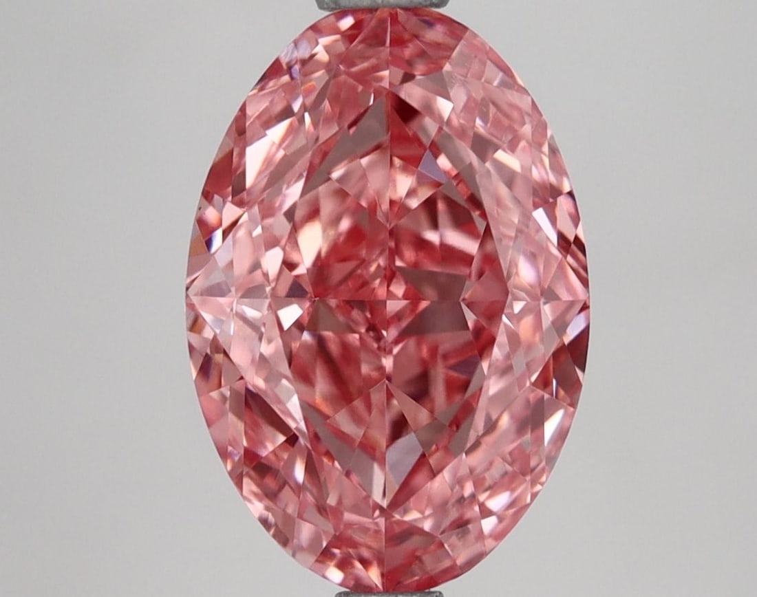 Loose Diamond - OVAL 2.98ct Fancy Vivid Pink VS1: Loose Diamond - OVAL 2.98ct Fancy Vivid Pink VS1 Source: This is a real non-mined Diamond that has been grown in a lab Shape: OVAL Carats: 2.98 Color: Fancy Vivid Pink Certification: IGI Video: