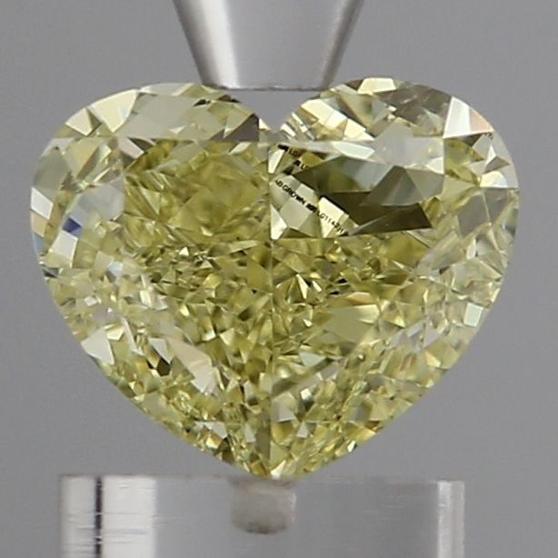 Loose Diamond - HEART 1.18ct Fancy Intense Yellow VS1: Loose Diamond - HEART 1.18ct Fancy Intense Yellow VS1 Source: This is a real non-mined Diamond that has been grown in a lab Shape: HEART Carats: 1.18 Color: Fancy Intense Yellow Certification: IGI Vid