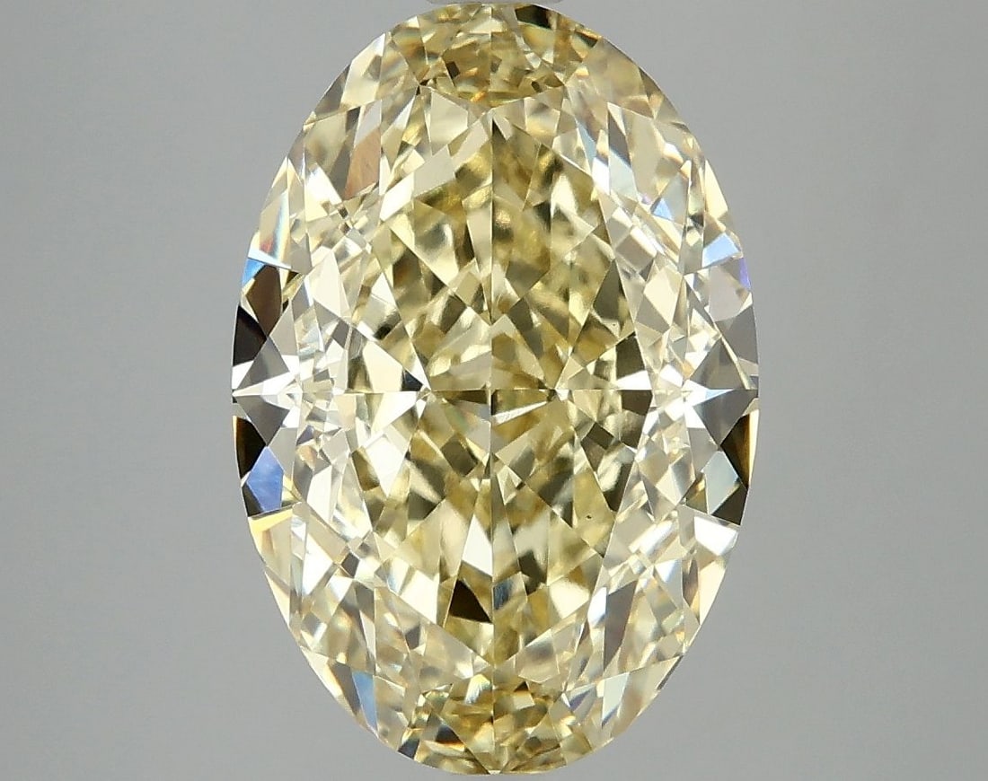Loose Diamond - OVAL 6.07ct Fancy Vivid Yellow VS1: Loose Diamond - OVAL 6.07ct Fancy Vivid Yellow VS1 Source: This is a real non-mined Diamond that has been grown in a lab Shape: OVAL Carats: 6.07 Color: Fancy Vivid Yellow Certification: IGI Video: