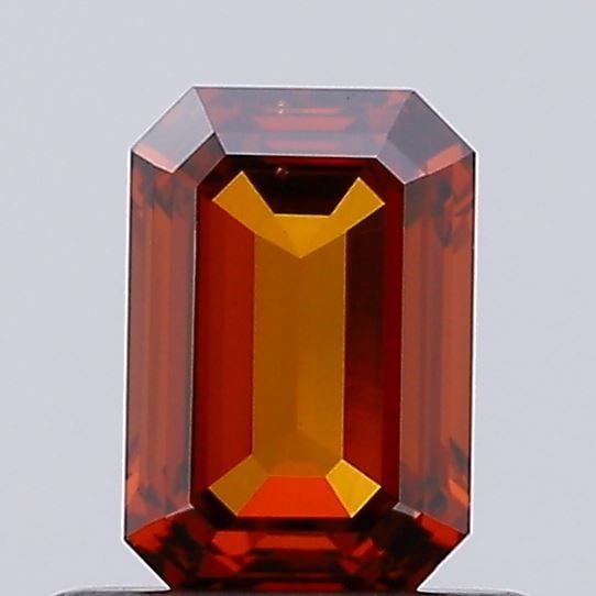 Loose Diamond - EMERALD 0.63ct Fancy Vivid Brownish Orange VS2: Loose Diamond - EMERALD 0.63ct Fancy Vivid Brownish Orange VS2 Source: This is a real non-mined Diamond that has been grown in a lab Shape: EMERALD Carats: 0.63 Color: Fancy Vivid Brownish Orange Cert