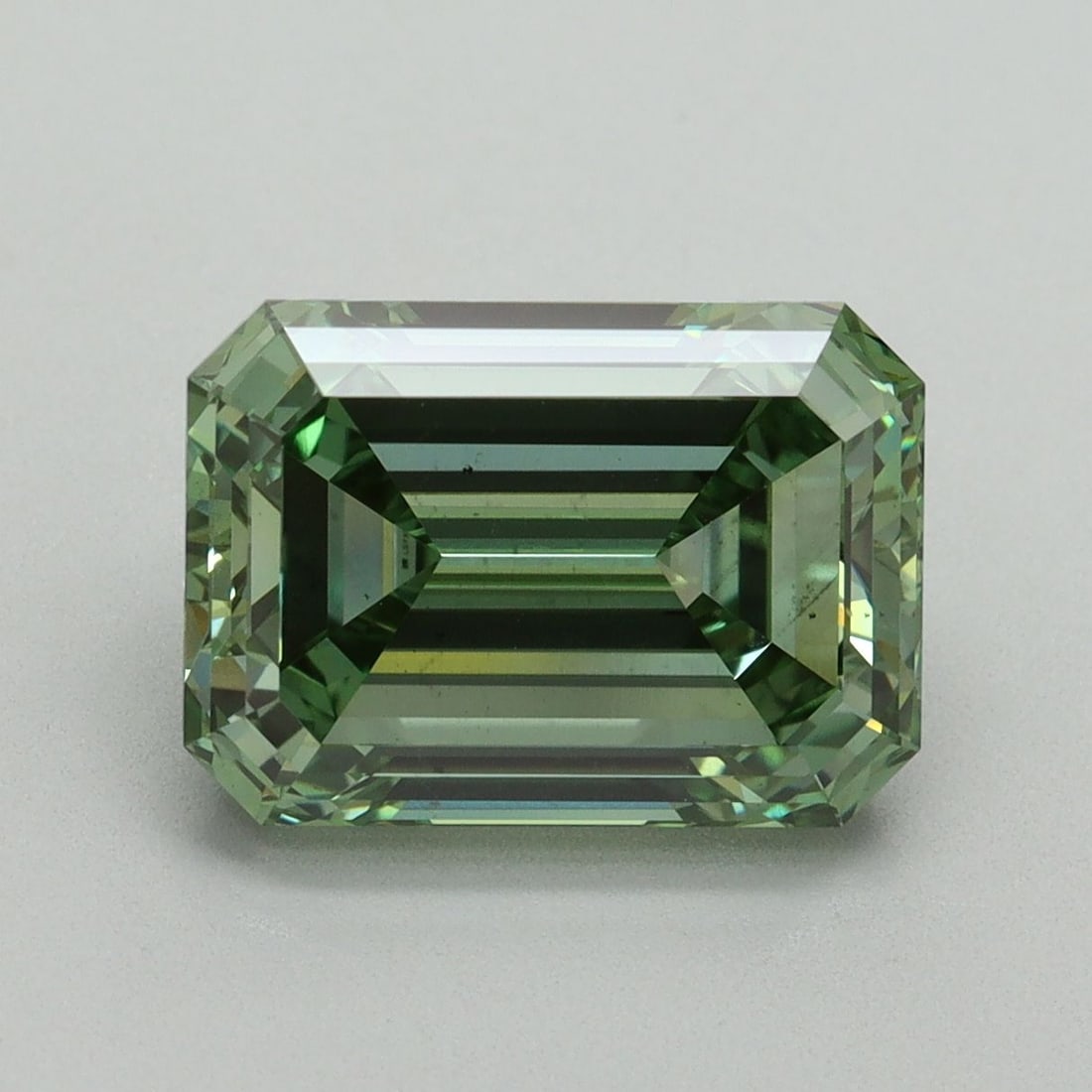 Loose Diamond - EMERALD 4.18ct Fancy Vivid Green VS2: Loose Diamond - EMERALD 4.18ct Fancy Vivid Green VS2 Source: This is a real non-mined Diamond that has been grown in a lab Shape: EMERALD Carats: 4.18 Color: Fancy Vivid Green Certification: IGI Video