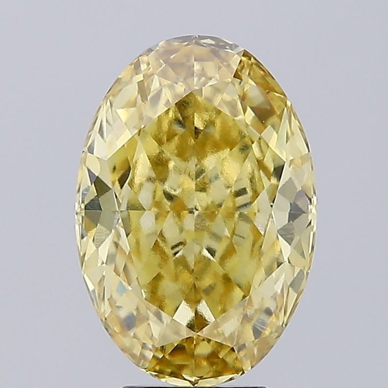 Loose Diamond - OVAL 5.21ct Fancy Vivid Yellow VS1: Loose Diamond - OVAL 5.21ct Fancy Vivid Yellow VS1 Source: This is a real non-mined Diamond that has been grown in a lab Shape: OVAL Carats: 5.21 Color: Fancy Vivid Yellow Certification: IGI Video:
