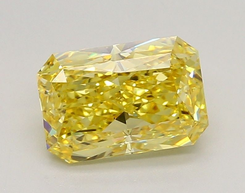 Loose Diamond - RADIANT 1.72ct Fancy Vivid Yellow VS1: Loose Diamond - RADIANT 1.72ct Fancy Vivid Yellow VS1 Source: This is a real non-mined Diamond that has been grown in a lab Shape: RADIANT Carats: 1.72 Color: Fancy Vivid Yellow Certification: IGI Vid