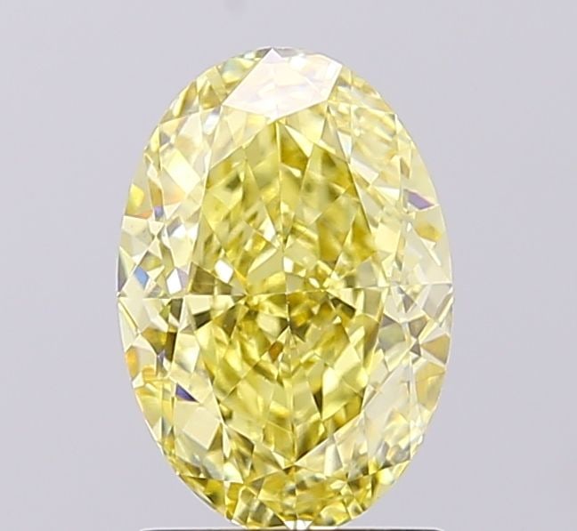 Loose Diamond - OVAL 2.1ct Fancy Yellow VVS2: Loose Diamond - OVAL 2.1ct Fancy Yellow VVS2 Source: This is a real non-mined Diamond that has been grown in a lab Shape: OVAL Carats: 2.1 Color: Fancy Yellow Certification: IGI Video: