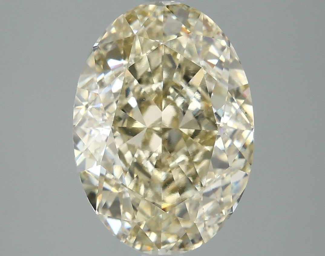 Loose Diamond - OVAL 5.25ct Fancy Light Yellow VS1: Loose Diamond - OVAL 5.25ct Fancy Light Yellow VS1 Source: This is a real non-mined Diamond that has been grown in a lab Shape: OVAL Carats: 5.25 Color: Fancy Light Yellow Certification: IGI Video: