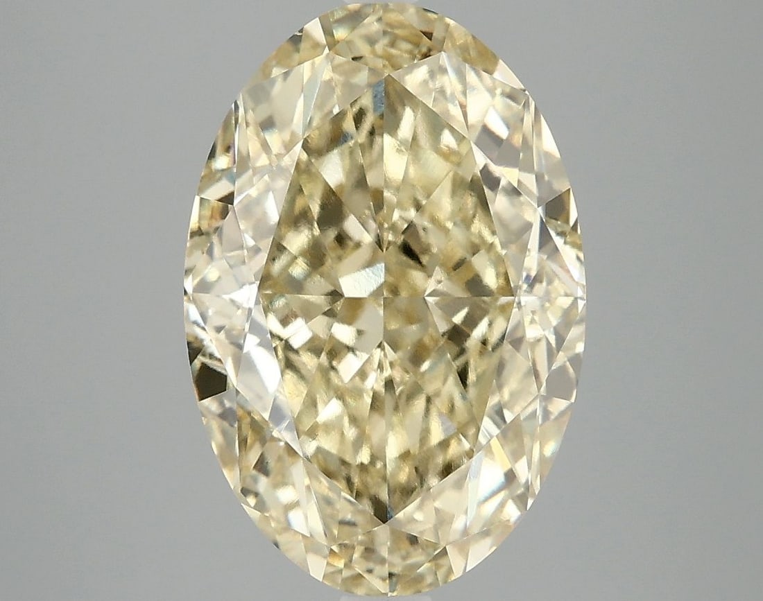 Loose Diamond - OVAL 6.07ct Fancy Vivid Yellow VS1: Loose Diamond - OVAL 6.07ct Fancy Vivid Yellow VS1 Source: This is a real non-mined Diamond that has been grown in a lab Shape: OVAL Carats: 6.07 Color: Fancy Vivid Yellow Certification: IGI Video: