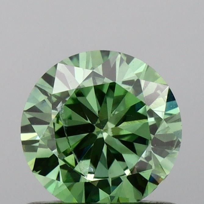 Loose Diamond - ROUND 0.69ct Fancy Vivid Green SI2: Loose Diamond - ROUND 0.69ct Fancy Vivid Green SI2 Source: This is a real non-mined Diamond that has been grown in a lab Shape: ROUND Carats: 0.69 Color: Fancy Vivid Green Certification: IGI Video: