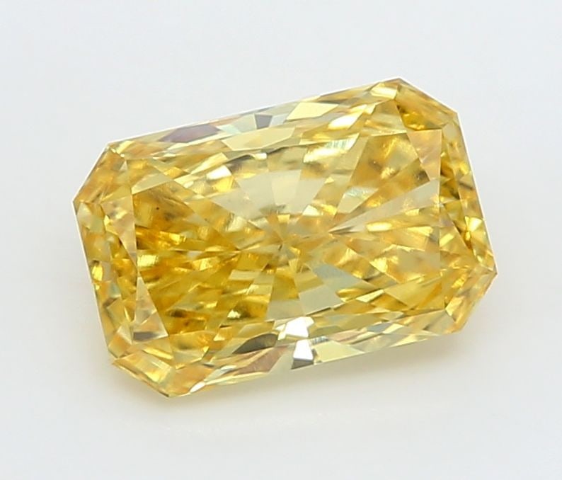 Loose Diamond - RADIANT 1.51ct Fancy Vivid Yellow VS1: Loose Diamond - RADIANT 1.51ct Fancy Vivid Yellow VS1 Source: This is a real non-mined Diamond that has been grown in a lab Shape: RADIANT Carats: 1.51 Color: Fancy Vivid Yellow Certification: IGI Vid