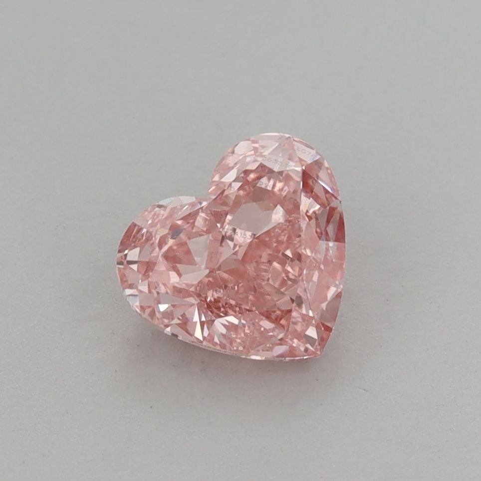 Loose Diamond - HEART 1.05ct Fancy Vivid Pink VS1: Loose Diamond - HEART 1.05ct Fancy Vivid Pink VS1 Source: This is a real non-mined Diamond that has been grown in a lab Shape: HEART Carats: 1.05 Color: Fancy Vivid Pink Certification: IGI The Diamond