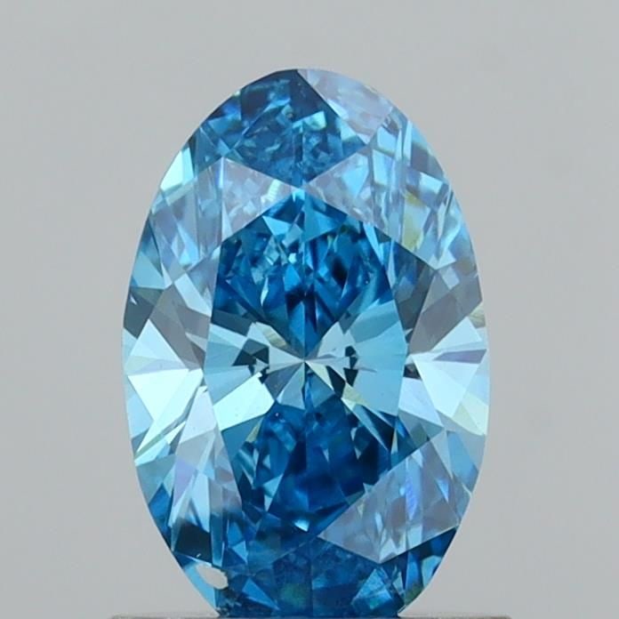 Loose Diamond - OVAL 1.01ct Fancy Vivid Blue VVS2: Loose Diamond - OVAL 1.01ct Fancy Vivid Blue VVS2 Source: This is a real non-mined Diamond that has been grown in a lab Shape: OVAL Carats: 1.01 Color: Fancy Vivid Blue Certification: IGI Video: