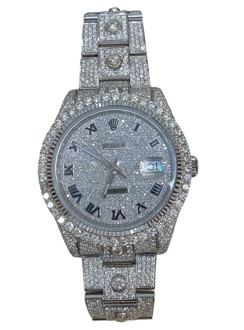 Datejust 126300 Oyster Bracelet Watch Diamond Roman Dial and Diamond Bezel: Datejust 126300 Oyster Bracelet Watch Diamond Roman Dial and Diamond Bezel This Rolex Datejust features a diamond Roman numeral dial and a diamond bezel, paired with an Oyster bracelet. The watch is d