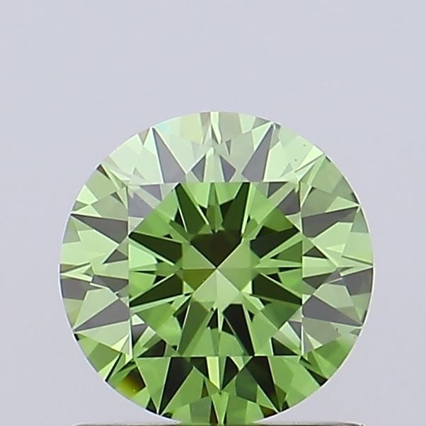 Ideal Loose Diamond - ROUND 0.94ct Fancy Vivid Green VS1: Ideal Loose Diamond - ROUND 0.94ct Fancy Vivid Green VS1 Source: This is a real non-mined Diamond that has been grown in a lab Shape: ROUND Carats: 0.94 Color: Fancy Vivid Green Certification: IGI Vid
