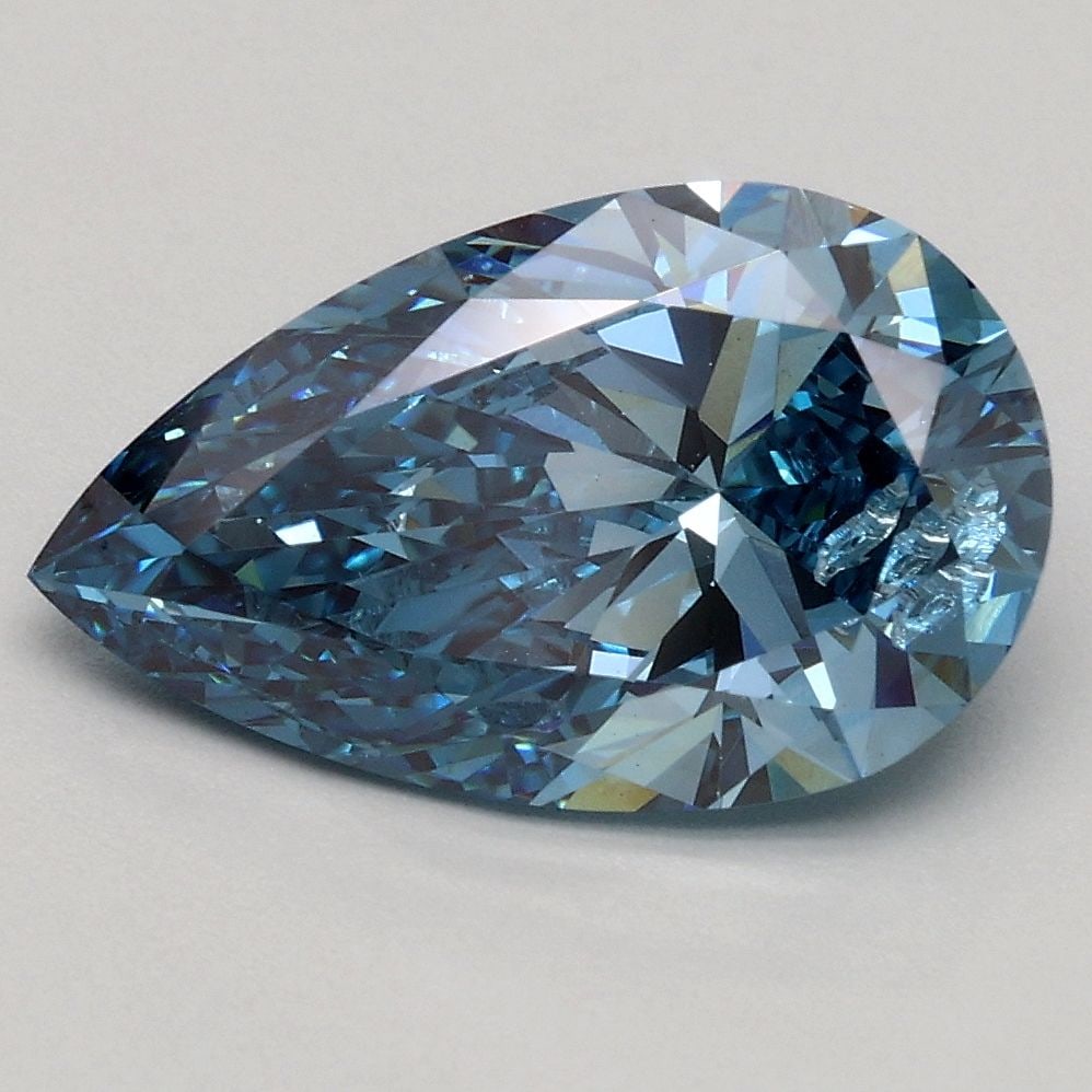 Loose Diamond - PEAR 2.05ct Fancy Vivid Blue SI2: Loose Diamond - PEAR 2.05ct Fancy Vivid Blue SI2 Source: This is a real non-mined Diamond that has been grown in a lab Shape: PEAR Carats: 2.05 Color: Fancy Vivid Blue Certification: IGI Video: