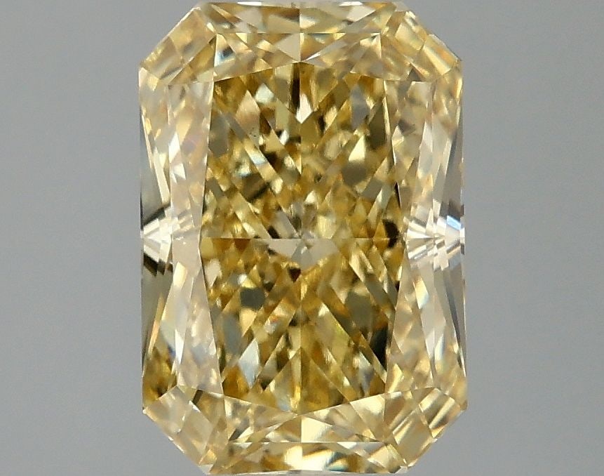Loose Diamond - RADIANT 3.06ct Fancy Vivid Yellow VS1: Loose Diamond - RADIANT 3.06ct Fancy Vivid Yellow VS1 Source: This is a real non-mined Diamond that has been grown in a lab Shape: RADIANT Carats: 3.06 Color: Fancy Vivid Yellow Certification: IGI Vid