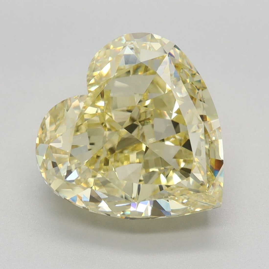 Loose Diamond - HEART 5.51ct Fancy Intense Yellow VS1: Loose Diamond - HEART 5.51ct Fancy Intense Yellow VS1 Source: This is a real non-mined Diamond that has been grown in a lab Shape: HEART Carats: 5.51 Color: Fancy Intense Yellow Certification: IGI Vid