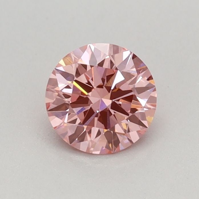Ideal Loose Diamond - ROUND 0.38ct Fancy Vivid Pink VS1: Ideal Loose Diamond - ROUND 0.38ct Fancy Vivid Pink VS1 Source: This is a real non-mined Diamond that has been grown in a lab Shape: ROUND Carats: 0.38 Color: Fancy Vivid Pink Certification: IGI Video
