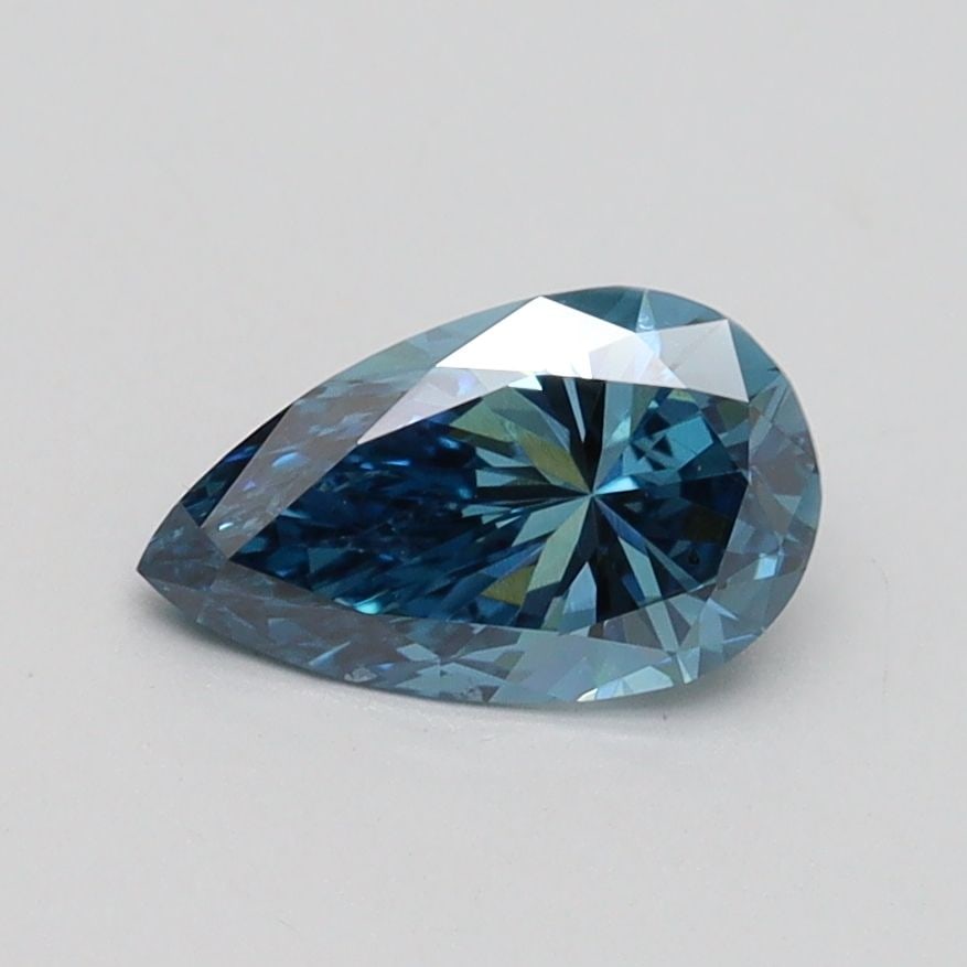 Loose Diamond - PEAR 0.8ct Fancy Vivid Blue SI1: Loose Diamond - PEAR 0.8ct Fancy Vivid Blue SI1 Source: This is a real non-mined Diamond that has been grown in a lab Shape: PEAR Carats: 0.8 Color: Fancy Vivid Blue Certification: IGI Video: