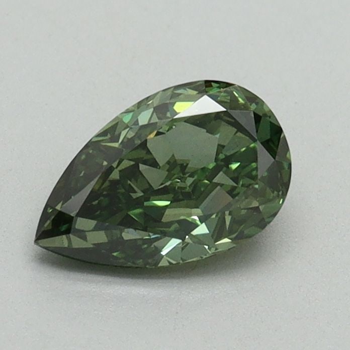 Loose Diamond - PEAR 0.7ct Fancy Vivid Green VS2: Loose Diamond - PEAR 0.7ct Fancy Vivid Green VS2 Source: This is a real non-mined Diamond that has been grown in a lab Shape: PEAR Carats: 0.7 Color: Fancy Vivid Green Certification: IGI Video: