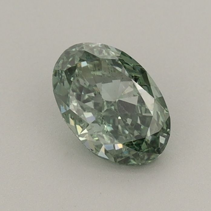 Loose Diamond - OVAL 0.6ct Fancy Vivid Green VS1: Loose Diamond - OVAL 0.6ct Fancy Vivid Green VS1 Source: This is a real non-mined Diamond that has been grown in a lab Shape: OVAL Carats: 0.6 Color: Fancy Vivid Green Certification: IGI Video: