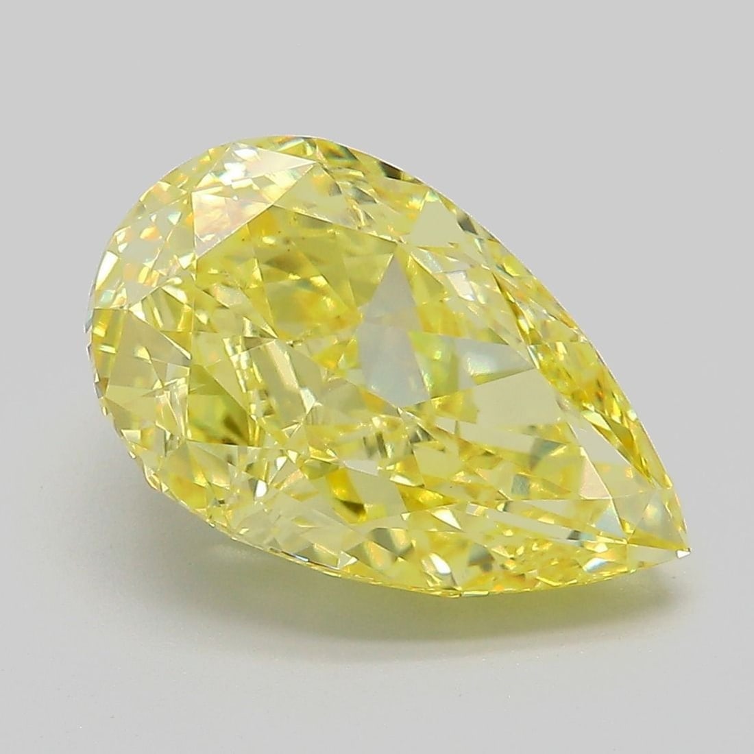 Loose Diamond - PEAR 5.05ct Fancy Vivid Yellow VVS2: Loose Diamond - PEAR 5.05ct Fancy Vivid Yellow VVS2 Source: This is a real non-mined Diamond that has been grown in a lab Shape: PEAR Carats: 5.05 Color: Fancy Vivid Yellow Certification: IGI Video: