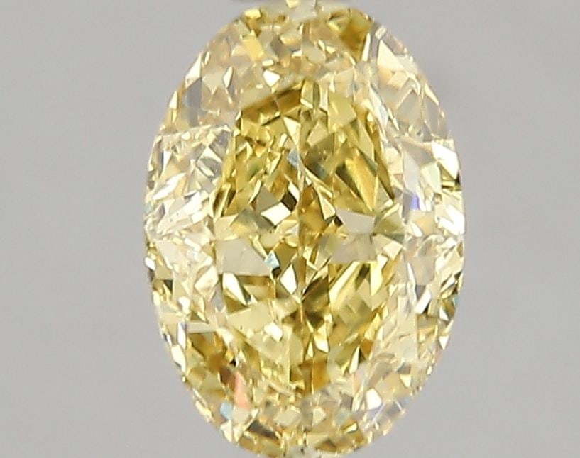 Loose Diamond - OVAL 2.02ct Fancy Vivid Yellow VS2: Loose Diamond - OVAL 2.02ct Fancy Vivid Yellow VS2 Source: This is a real non-mined Diamond that has been grown in a lab Shape: OVAL Carats: 2.02 Color: Fancy Vivid Yellow Certification: IGI Video:
