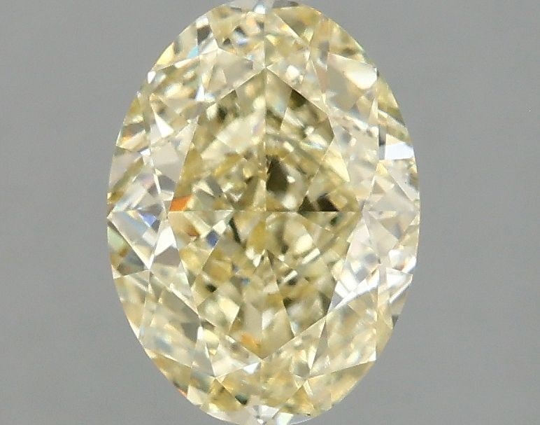 Loose Diamond - OVAL 2.1ct Fancy Yellow VS1: Loose Diamond - OVAL 2.1ct Fancy Yellow VS1 Source: This is a real non-mined Diamond that has been grown in a lab Shape: OVAL Carats: 2.1 Color: Fancy Yellow Certification: IGI Video:
