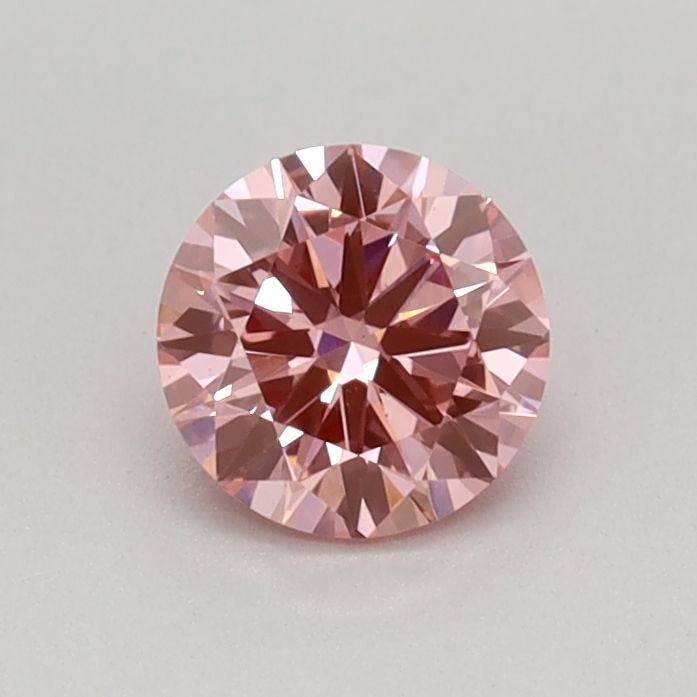 Loose Diamond - ROUND 0.4ct Fancy Vivid Pink VS1: Loose Diamond - ROUND 0.4ct Fancy Vivid Pink VS1 Source: This is a real non-mined Diamond that has been grown in a lab Shape: ROUND Carats: 0.4 Color: Fancy Vivid Pink Certification: IGI Video: