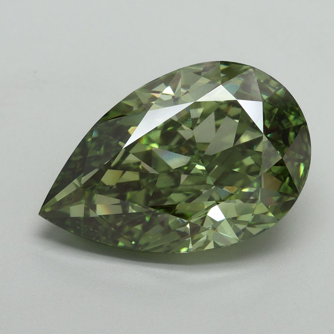 Loose Diamond - PEAR 11.51ct Fancy Vivid Green VS1: Loose Diamond - PEAR 11.51ct Fancy Vivid Green VS1 Source: This is a real non-mined Diamond that has been grown in a lab Shape: PEAR Carats: 11.51 Color: Fancy Vivid Green Certification: IGI Video: