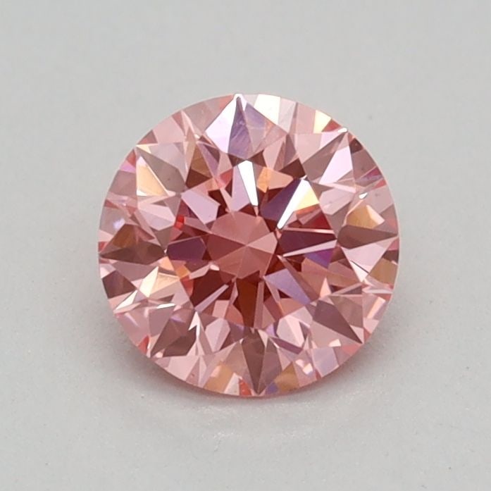 Loose Diamond - ROUND 0.36ct Fancy Vivid Pink VS1: Loose Diamond - ROUND 0.36ct Fancy Vivid Pink VS1 Source: This is a real non-mined Diamond that has been grown in a lab Shape: ROUND Carats: 0.36 Color: Fancy Vivid Pink Certification: IGI Video: