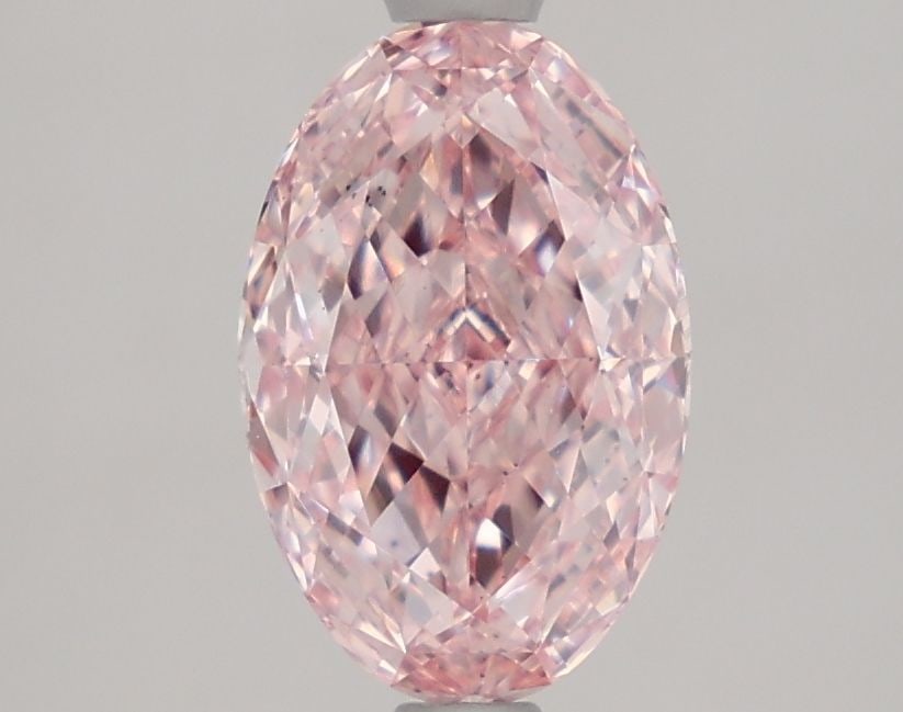 Loose Diamond - OVAL 1.86ct Fancy Vivid Pink VS2: Loose Diamond - OVAL 1.86ct Fancy Vivid Pink VS2 Source: This is a real non-mined Diamond that has been grown in a lab Shape: OVAL Carats: 1.86 Color: Fancy Vivid Pink Certification: IGI Video: