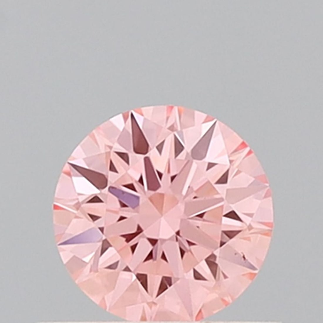 Ideal Loose Diamond - ROUND 2.01ct Fancy Vivid Pink VS1: Ideal Loose Diamond - ROUND 2.01ct Fancy Vivid Pink VS1 Source: This is a real non-mined Diamond that has been grown in a lab Shape: ROUND Carats: 2.01 Color: Fancy Vivid Pink Certification: IGI Video