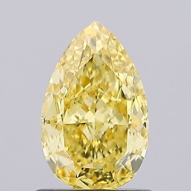 Loose Diamond - PEAR 1.04ct Fancy Vivid Yellow VS1: Loose Diamond - PEAR 1.04ct Fancy Vivid Yellow VS1 Source: This is a real non-mined Diamond that has been grown in a lab Shape: PEAR Carats: 1.04 Color: Fancy Vivid Yellow Certification: IGI Video: