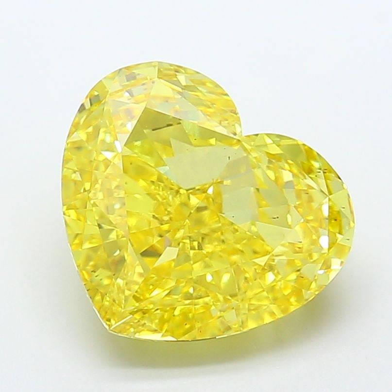 Loose Diamond - HEART 10.53ct Fancy Vivid Yellow VS2: Loose Diamond - HEART 10.53ct Fancy Vivid Yellow VS2 Source: This is a real non-mined Diamond that has been grown in a lab Shape: HEART Carats: 10.53 Color: Fancy Vivid Yellow Certification: IGI Video