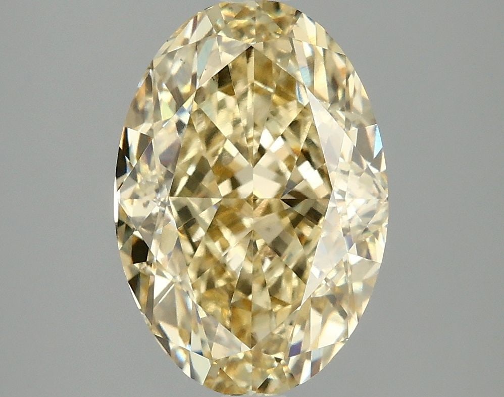 Loose Diamond - OVAL 3.08ct Fancy Intense Yellow VS1: Loose Diamond - OVAL 3.08ct Fancy Intense Yellow VS1 Source: This is a real non-mined Diamond that has been grown in a lab Shape: OVAL Carats: 3.08 Color: Fancy Intense Yellow Certification: IGI Video
