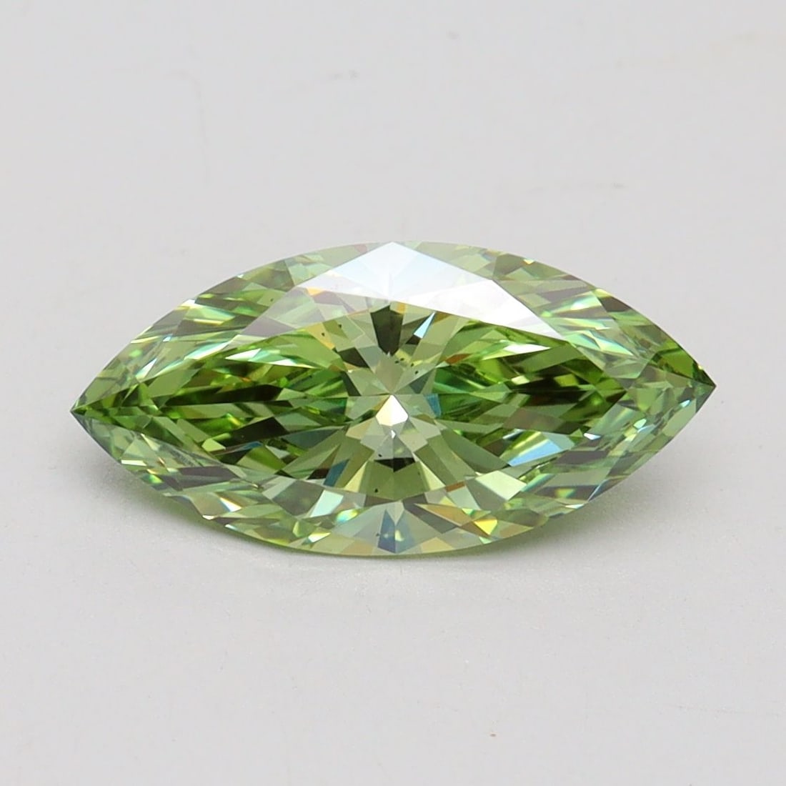 Loose Diamond - MARQUISE 1.54ct Fancy Vivid Green VS2: Loose Diamond - MARQUISE 1.54ct Fancy Vivid Green VS2 Source: This is a real non-mined Diamond that has been grown in a lab Shape: MARQUISE Carats: 1.54 Color: Fancy Vivid Green Certification: IGI Vid