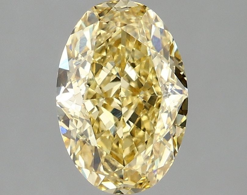 Loose Diamond - OVAL 2.08ct Fancy Intense Yellow VS2: Loose Diamond - OVAL 2.08ct Fancy Intense Yellow VS2 Source: This is a real non-mined Diamond that has been grown in a lab Shape: OVAL Carats: 2.08 Color: Fancy Intense Yellow Certification: IGI Video