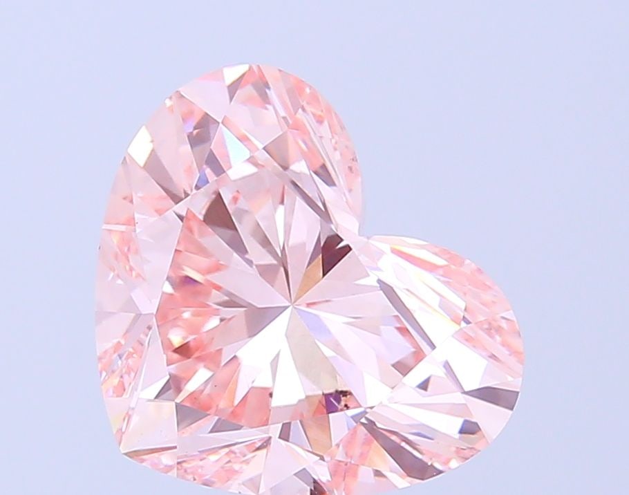 Loose Diamond - HEART 4.06ct Fancy Vivid Pink SI1: Loose Diamond - HEART 4.06ct Fancy Vivid Pink SI1 Source: This is a real non-mined Diamond that has been grown in a lab Shape: HEART Carats: 4.06 Color: Fancy Vivid Pink Certification: IGI Video: