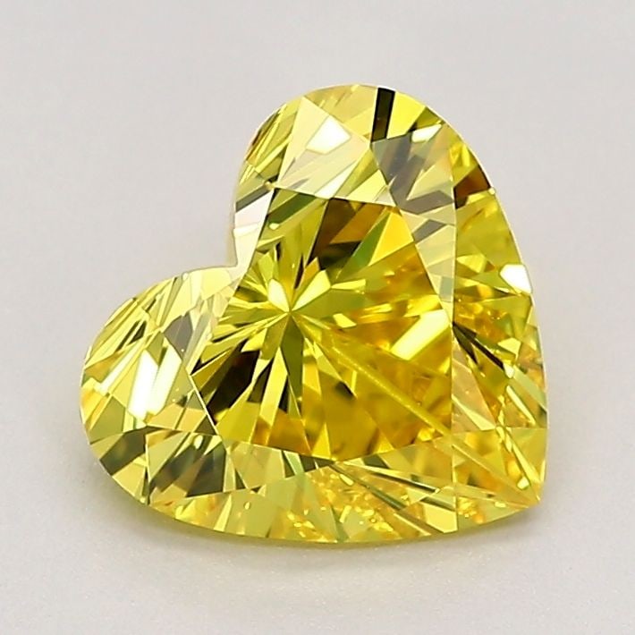 Loose Diamond - HEART 1.35ct Fancy Vivid Yellow VVS2: Loose Diamond - HEART 1.35ct Fancy Vivid Yellow VVS2 Source: This is a real non-mined Diamond that has been grown in a lab Shape: HEART Carats: 1.35 Color: Fancy Vivid Yellow Certification: IGI Video: