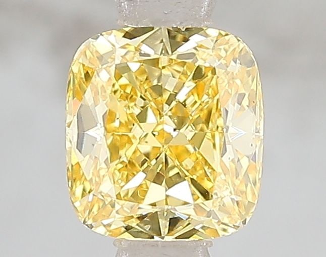Loose Diamond - CUSHION MODIFIED 1.01ct Fancy Vivid Yellow VS2: Loose Diamond - CUSHION MODIFIED 1.01ct Fancy Vivid Yellow VS2 Source: This is a real non-mined Diamond that has been grown in a lab Shape: CUSHION MODIFIED Carats: 1.01 Color: Fancy Vivid Yellow Cert